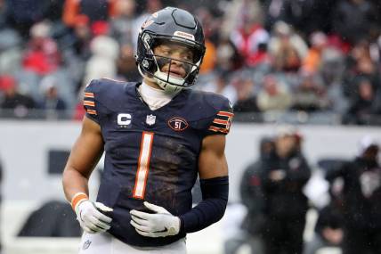 Dec 31, 2023; Chicago, Illinois, USA; Chicago Bears quarterback Justin Fields (1) during the second half against the Atlanta Falcons at Soldier Field. Mandatory Credit: Mike Dinovo-USA TODAY Sports