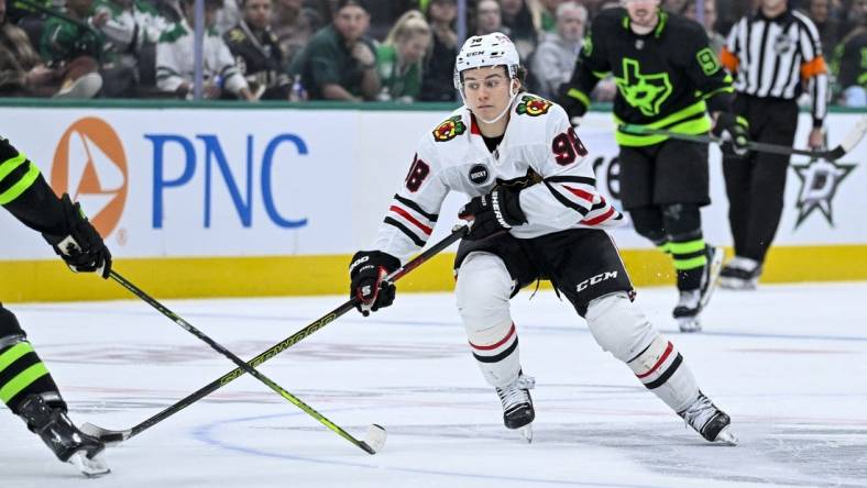 Dec 31, 2023; Dallas, Texas, USA; Chicago Blackhawks center Connor Bedard (98) in action during the game between the Dallas Stars and the Chicago Blackhawks at the American Airlines Center. Mandatory Credit: Jerome Miron-USA TODAY Sports