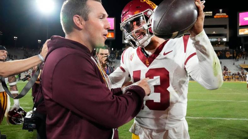 Arizona State Sun Devils head coach Kenny Dillingham congratulates USC Trojans quarterback Caleb Williams (13) on his 42-28 win at Mountain America Stadium on Sep 23, 2023.