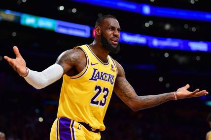Jan 3, 2024; Los Angeles, California, USA; Los Angeles Lakers forward LeBron James (23) reacts to a call against him during the first half at Crypto.com Arena. Mandatory Credit: Gary A. Vasquez-USA TODAY Sports
