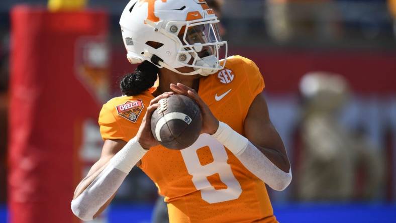 Tennessee quarterback Nico Iamaleava (8) warming up for the Citrus Bowl NCAA College football game on Monday, January 1, 2024 in Orlando, Fla.