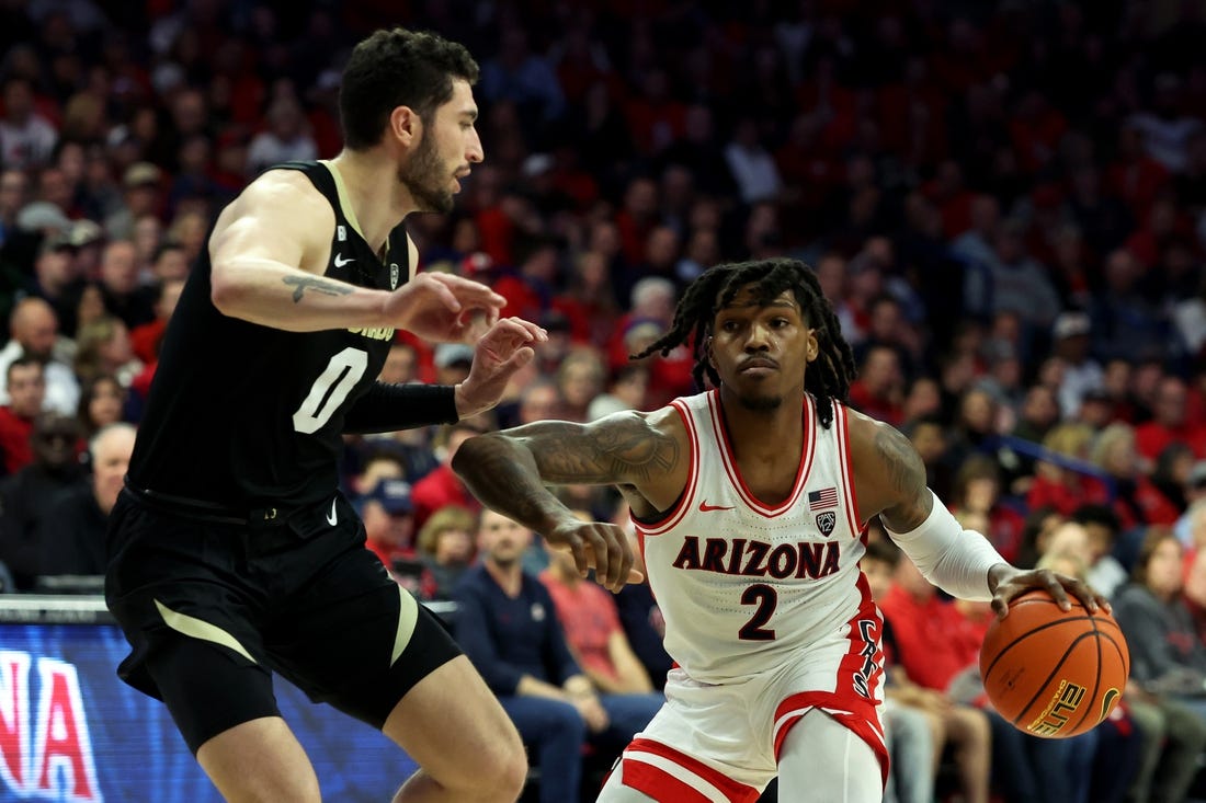 Jan 4, 2024; Tucson, Arizona, USA; Arizona Wildcats guard Caleb Love (2) drives to the net against Colorado Buffaloes guard Luke O'Brien (0) during the second half at McKale Center. Mandatory Credit: Zachary BonDurant-USA TODAY Sports