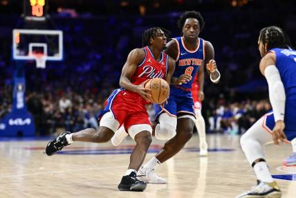 Jan 5, 2024; Philadelphia, Pennsylvania, USA; Philadelphia 76ers guard Tyrese Maxey (0) drives against New York Knicks forward OG Anunoby (8) in the fourth quarter at Wells Fargo Center. Mandatory Credit: Kyle Ross-USA TODAY Sports