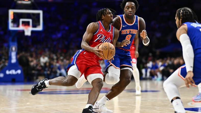 Jan 5, 2024; Philadelphia, Pennsylvania, USA; Philadelphia 76ers guard Tyrese Maxey (0) drives against New York Knicks forward OG Anunoby (8) in the fourth quarter at Wells Fargo Center. Mandatory Credit: Kyle Ross-USA TODAY Sports