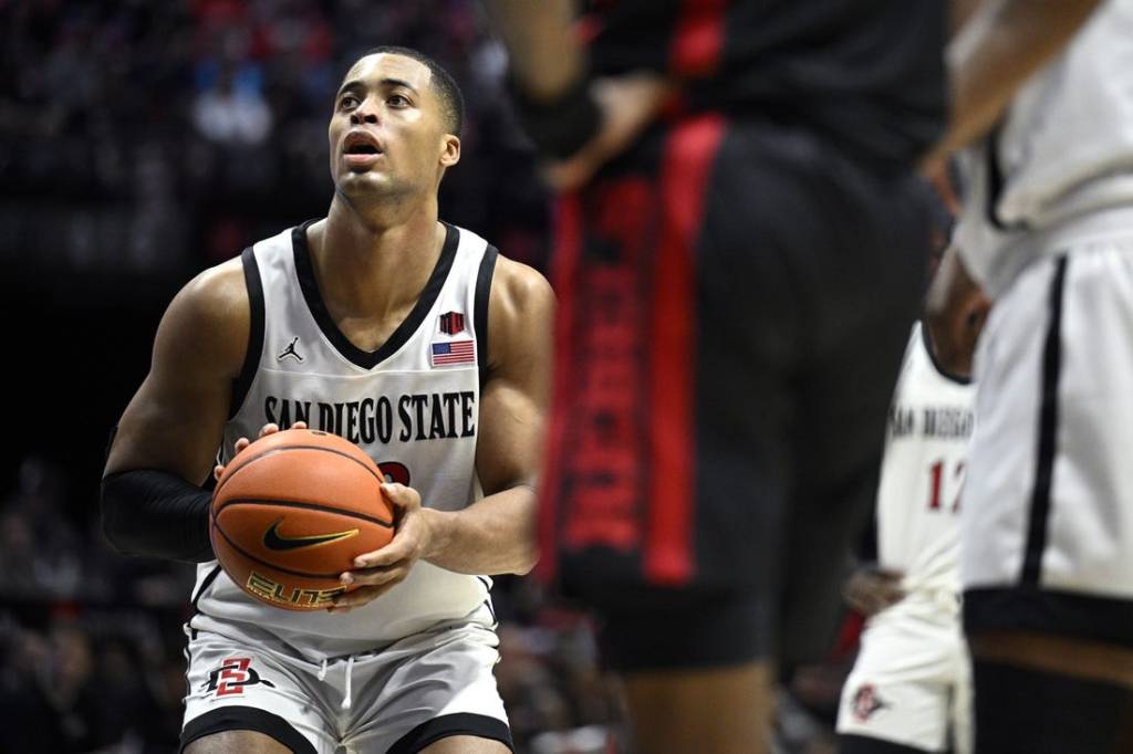 Jan 6, 2024; San Diego, California, USA; San Diego State Aztecs forward Jaedon LeDee (13) shoots a free throw during the second half against the UNLV Rebels at Viejas Arena. Mandatory Credit: Orlando Ramirez-USA TODAY Sports