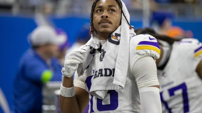 Jan 7, 2024; Detroit, Michigan, USA; Minnesota Vikings wide receiver Justin Jefferson (18) looks at the big screen during second half of the game against the Detroit Lions at Ford Field. Mandatory Credit: David Reginek-USA TODAY Sports