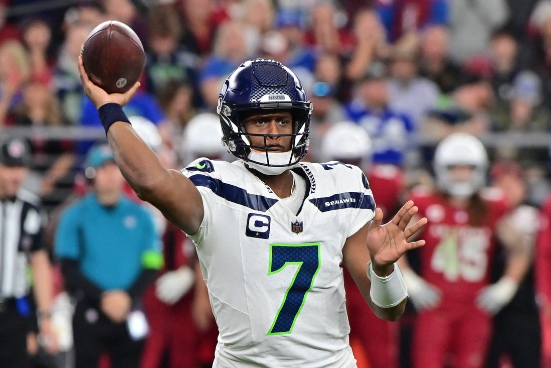 Jan 7, 2024; Glendale, Arizona, USA; Seattle Seahawks quarterback Geno Smith (7) throws in the second half against the Arizona Cardinals at State Farm Stadium. Mandatory Credit: Matt Kartozian-USA TODAY Sports