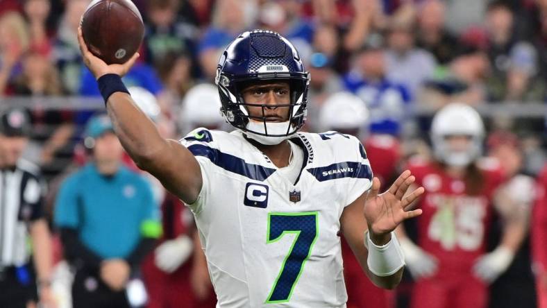 Jan 7, 2024; Glendale, Arizona, USA; Seattle Seahawks quarterback Geno Smith (7) throws in the second half against the Arizona Cardinals at State Farm Stadium. Mandatory Credit: Matt Kartozian-USA TODAY Sports