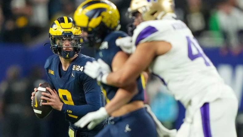 Michigan quarterback J.J. McCarthy (9) looks to pass the ball in the second half of the College Football Playoff national championship game against Washington at NRG Stadium in Houston, Texas on Monday, January 8, 2024.