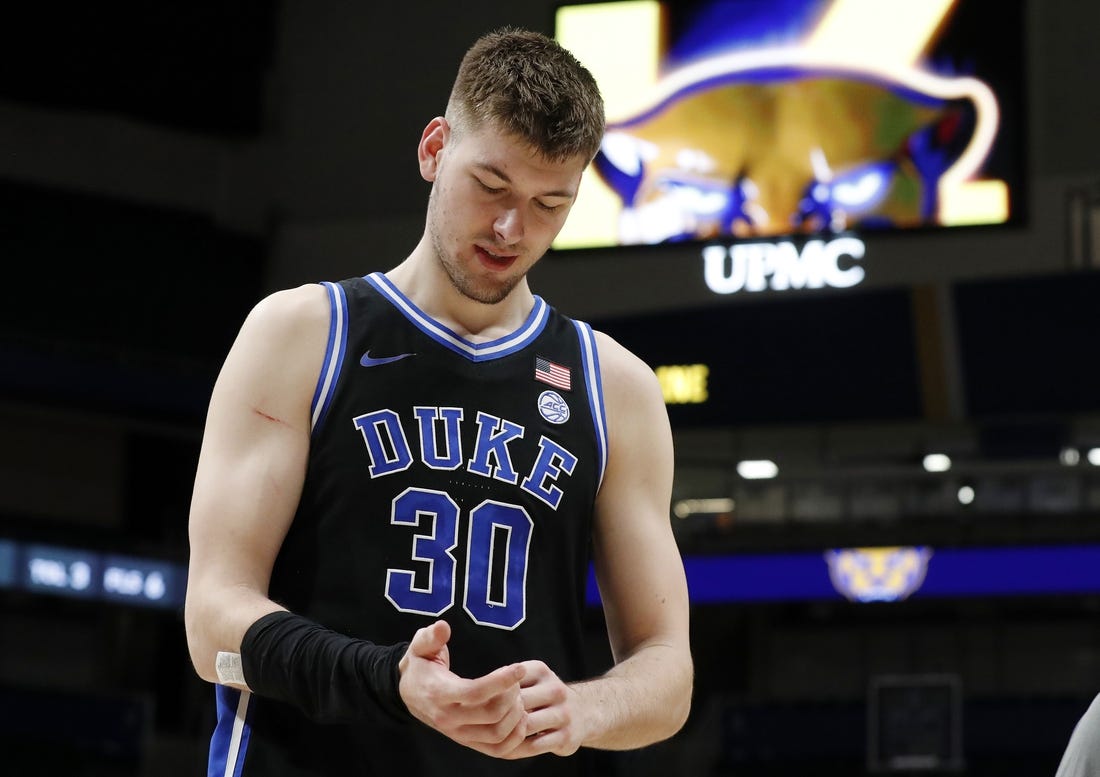 Jan 9, 2024; Pittsburgh, Pennsylvania, USA;  Duke Blue Devils center Kyle Filipowski (30) reacts as he leaves the court after defeating the Pittsburgh Panthers at the Petersen Events Center. Duke won 75-53. Mandatory Credit: Charles LeClaire-USA TODAY Sports