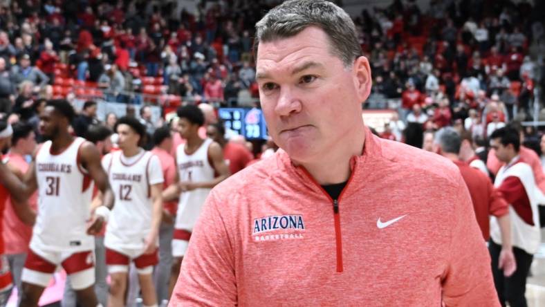 Jan 13, 2024; Pullman, Washington, USA; Arizona Wildcats head coach Tommy Lloyd walks off the court after a game against the Washington State Cougars at Friel Court at Beasley Coliseum. Mandatory Credit: James Snook-USA TODAY Sports