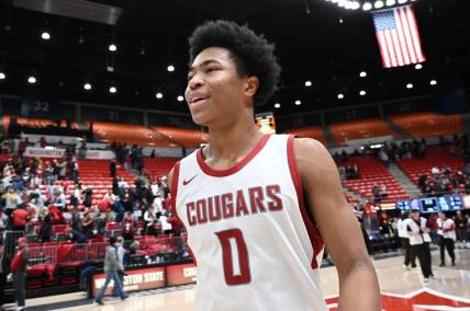 Jan 13, 2024; Pullman, Washington, USA; Washington State Cougars forward Jaylen Wells (0) celebrates after a game against the Arizona Wildcats at Friel Court at Beasley Coliseum. Mandatory Credit: James Snook-USA TODAY Sports