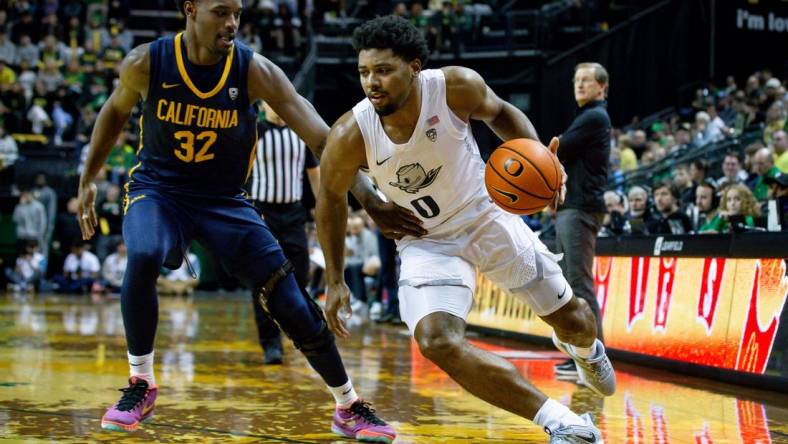 Oregon guard Kario Oquendo drives toward the basket as the Oregon Ducks host the California Golden Bears Saturday, Jan. 13, 2024 at Matthew Knight Arena in Eugene, Ore.