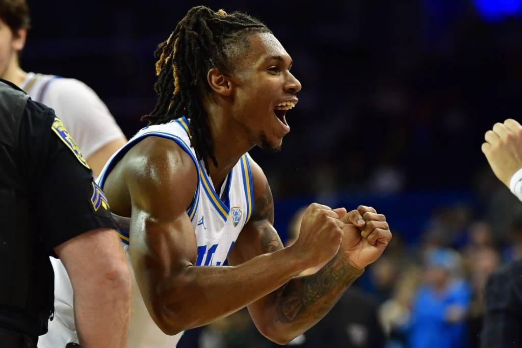 January 14, 2024; Los Angeles, California, USA; UCLA Bruins guard Dylan Andrews (2) celebrates the victory against the Washington Huskies at Pauley Pavilion. Mandatory Credit: Gary A. Vasquez-USA TODAY Sports