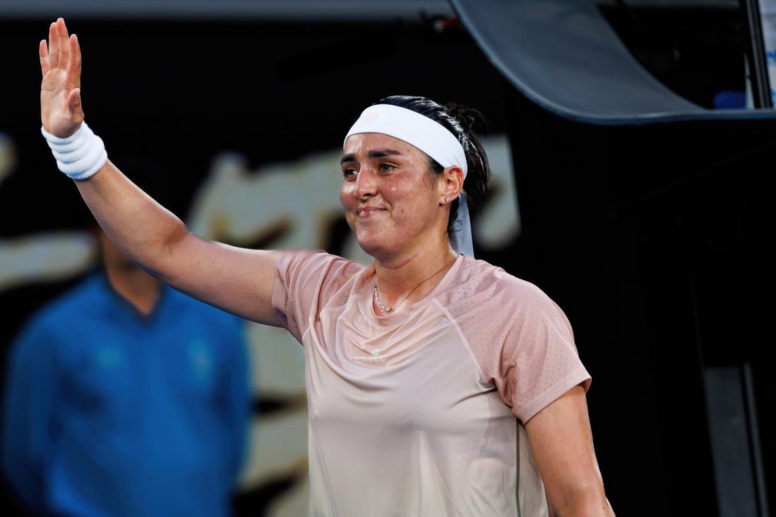 Jan 15, 2024; Melbourne, Victoria, Australia; Ons Jabeur of Tunisia celebrates her victory over Yulia Starodubtseva of Ukraine In the first round of the women   s singles at the Australian Open tennis.Mandatory Credit: Mike Frey-USA TODAY Sports