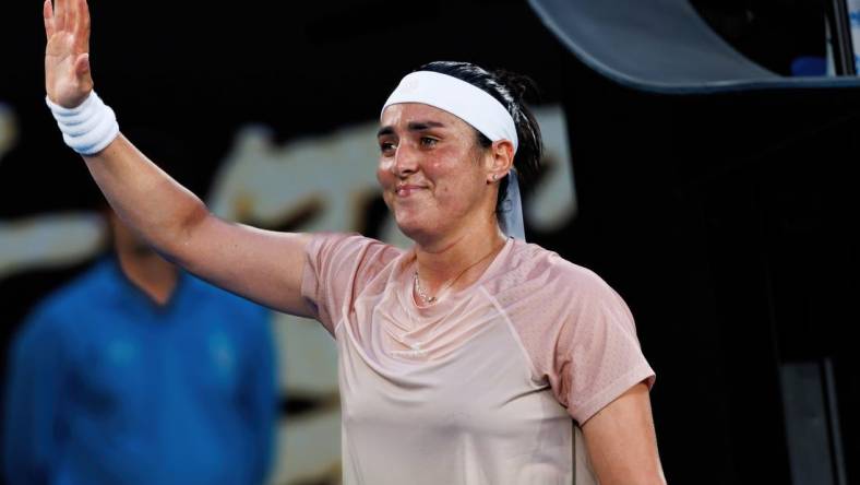 Jan 15, 2024; Melbourne, Victoria, Australia; Ons Jabeur of Tunisia celebrates her victory over Yulia Starodubtseva of Ukraine In the first round of the women   s singles at the Australian Open tennis.Mandatory Credit: Mike Frey-USA TODAY Sports