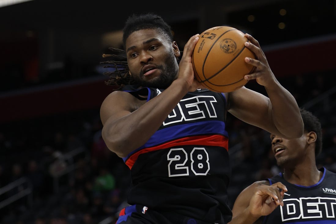 Jan 17, 2024; Detroit, Michigan, USA;  Detroit Pistons center Isaiah Stewart (28) grabs the rebound in the first half against the Minnesota Timberwolves at Little Caesars Arena. Mandatory Credit: Rick Osentoski-USA TODAY Sports