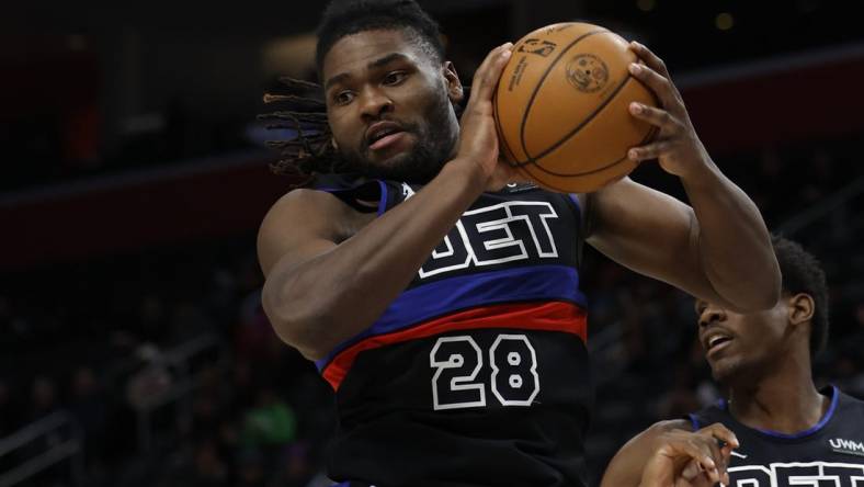 Jan 17, 2024; Detroit, Michigan, USA;  Detroit Pistons center Isaiah Stewart (28) grabs the rebound in the first half against the Minnesota Timberwolves at Little Caesars Arena. Mandatory Credit: Rick Osentoski-USA TODAY Sports