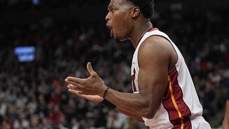 Jan 17, 2024; Toronto, Ontario, CAN; Miami Heat guard Kyle Lowry (7) reacts after a play against the Toronto Raptors during the second half at Scotiabank Arena. Mandatory Credit: John E. Sokolowski-USA TODAY Sports