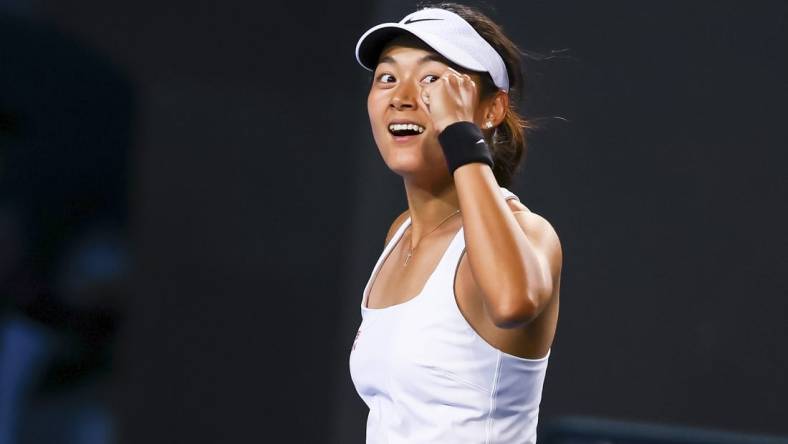 Jan 18, 2024; Melbourne, Victoria, Australia; Yafan Wang of China celebrates her win against Emma Raducanu (not pictured) of Great Britain in Round 2 of the Women's Singles on Day 5 of the Australian Open tennis at 1573 Arena. Mandatory Credit: Mike Frey-USA TODAY Sports