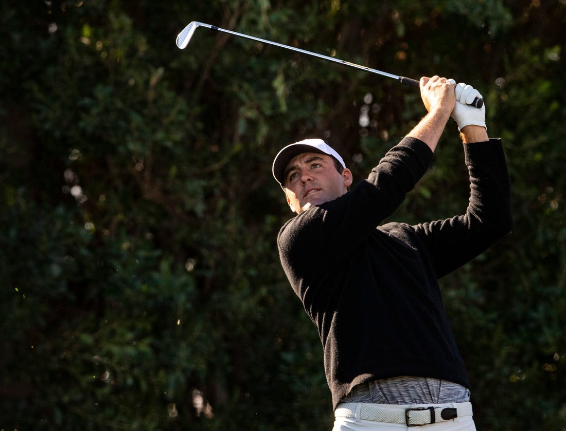 Scottie Scheffler tees off on hole three during Round 1 of The American Express at La Quinta Country Club in La Quinta, Calif., Thursday, Jan. 18, 2024.