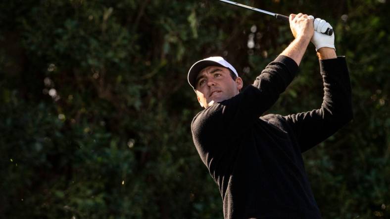 Scottie Scheffler tees off on hole three during Round 1 of The American Express at La Quinta Country Club in La Quinta, Calif., Thursday, Jan. 18, 2024.