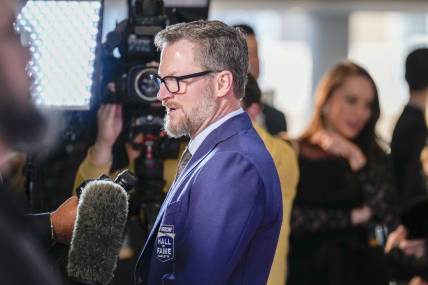 Jan 19, 2024; Charlotte, NC, USA; Dale Earnhardt Jr. talks to interviewers during the red carpet at Charlotte Convention Center Crown Ballroom. Mandatory Credit: Jim Dedmon-USA TODAY Sports