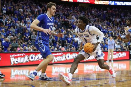 Jan 20, 2024; Newark, New Jersey, USA; Seton Hall Pirates guard Kadary Richmond (1) drives to the basket against Creighton Bluejays center Ryan Kalkbrenner (11) during double overtime at Prudential Center. Mandatory Credit: Vincent Carchietta-USA TODAY Sports