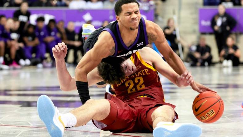 Jan 20, 2024; Fort Worth, Texas, USA;  TCU Horned Frogs guard Jameer Nelson Jr. (4) and Iowa State Cyclones forward Milan Momcilovic (22) go for a loose ball during the second half at Ed and Rae Schollmaier Arena. Mandatory Credit: Kevin Jairaj-USA TODAY Sports