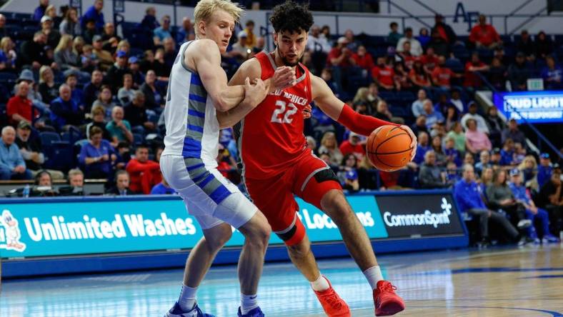 Jan 20, 2024; Colorado Springs, Colorado, USA; New Mexico Lobos forward Mustapha Amzil (22) drives to the basket against Air Force Falcons forward Rytis Petraitis (31) in the second half at Clune Arena. Mandatory Credit: Isaiah J. Downing-USA TODAY Sports