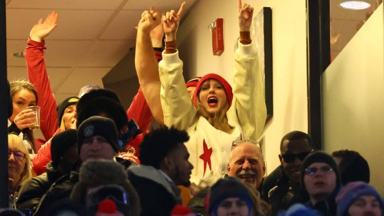 Jan 21, 2024; Orchard Park, New York, USA; Taylor Swift reacts after Kansas City Chiefs tight end Travis Kelce (not pictured) scores a touchdown in the 2024 AFC divisional round game between against the Buffalo Bills at Highmark Stadium. Mandatory Credit: Mark J. Rebilas-USA TODAY Sports