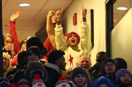 Jan 21, 2024; Orchard Park, New York, USA; Taylor Swift reacts after Kansas City Chiefs tight end Travis Kelce (not pictured) scores a touchdown in the 2024 AFC divisional round game between against the Buffalo Bills at Highmark Stadium. Mandatory Credit: Mark J. Rebilas-USA TODAY Sports