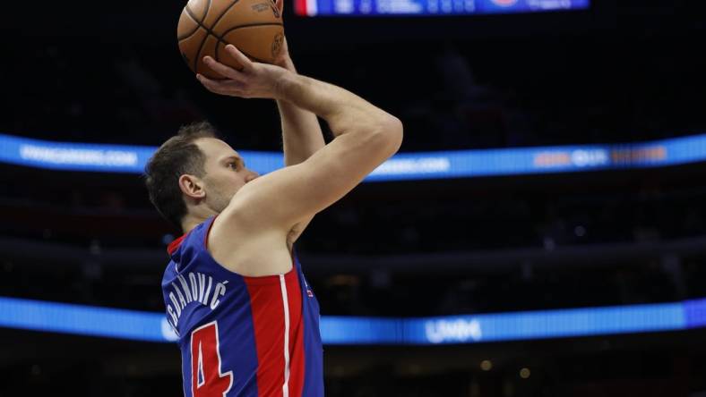 Jan 24, 2024; Detroit, Michigan, USA;  Detroit Pistons forward Bojan Bogdanovic (44) shoots in the first half against the Charlotte Hornets at Little Caesars Arena. Mandatory Credit: Rick Osentoski-USA TODAY Sports