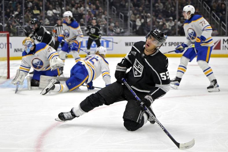 Jan 24, 2024; Los Angeles, California, USA; Los Angeles Kings right wing Quinton Byfield (55) reacts after a save off a shot on goal by Buffalo Sabres goaltender Devon Levi (27) in the second period at Crypto.com Arena. Mandatory Credit: Jayne Kamin-Oncea-USA TODAY Sports