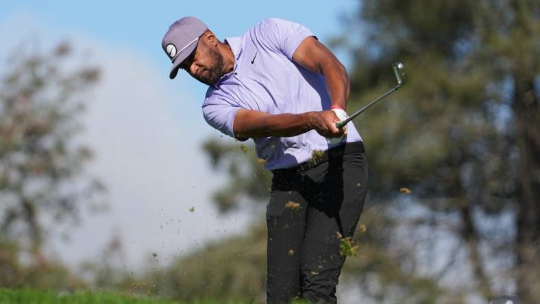 Jan 25, 2024; San Diego, California, USA; Tony Finau hits his tee shot on the eighth hole during the second round of the Farmers Insurance Open golf tournament at Torrey Pines Municipal Golf Course - North Course. Mandatory Credit: Ray Acevedo-USA TODAY Sports