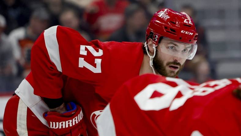 Jan 25, 2024; Detroit, Michigan, USA;  Detroit Red Wings center Michael Rasmussen (27) gets set during a face off in the first period against the Philadelphia Flyers at Little Caesars Arena. Mandatory Credit: Rick Osentoski-USA TODAY Sports