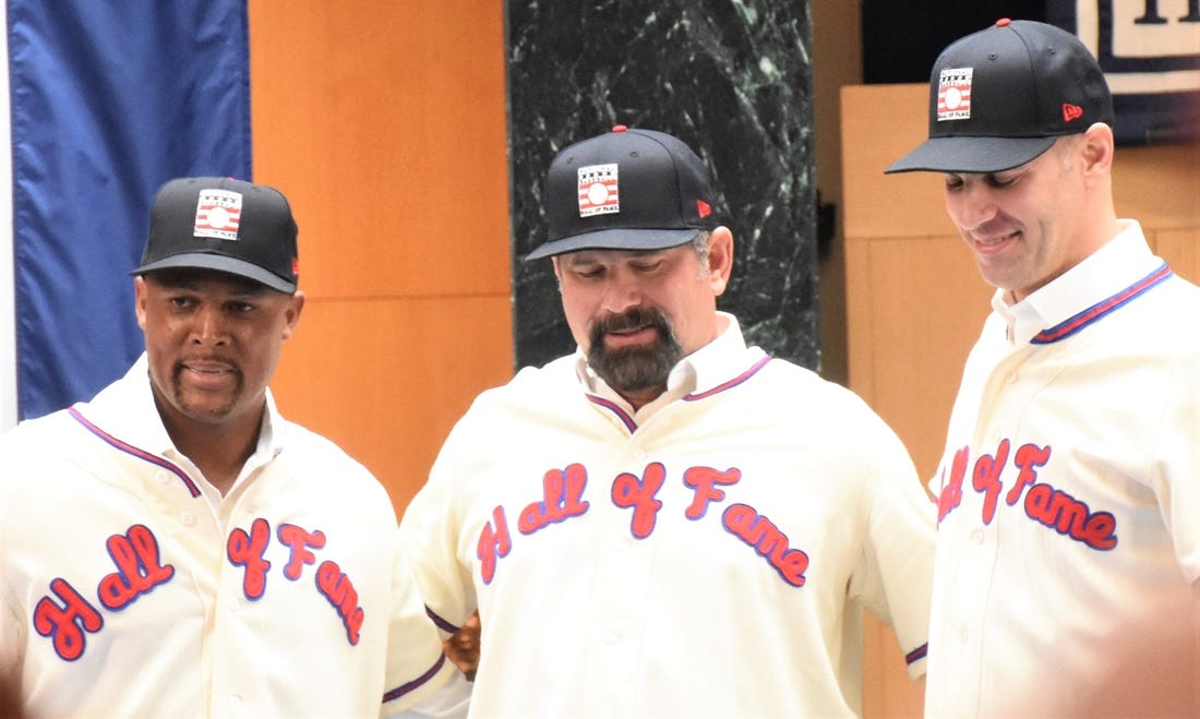 Adrian Beltre, Todd Helton and Joe Mauer (from left) visited the National Baseball Hall of Fame's plaque gallery in Cooperstown, New York, Thursday, Jan. 25, 2024, as the museum's newest electees. The trio's selection was announced Tuesday by the Baseball Writers Association of America.