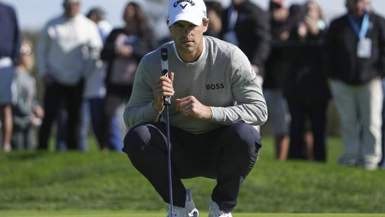 Jan 26, 2024; San Diego, California, USA; Thomas Detry lines up a putt on the second green during the third round of the Farmers Insurance Open golf tournament at Torrey Pines Municipal Golf Course - South Course. Mandatory Credit: Ray Acevedo-USA TODAY Sports