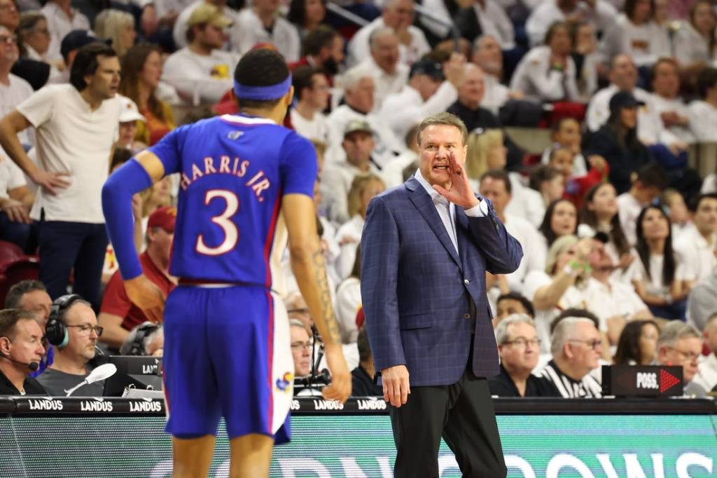 Feb 4, 2023; Ames, Iowa, USA;  Kansas Jayhawks head coach Bill Self talks with guard Dajuan Harris Jr. (3) during a game against the Iowa State Cyclones at James H. Hilton Coliseum. Mandatory Credit: Reese Strickland-USA TODAY Sports