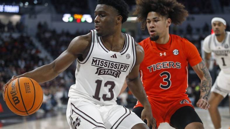 Jan 27, 2024; Starkville, Mississippi, USA; Mississippi State Bulldogs guard Josh Hubbard (13) dribbles as Auburn Tigers guard Tre Donaldson (3) defends during the second half at Humphrey Coliseum. Mandatory Credit: Petre Thomas-USA TODAY Sports