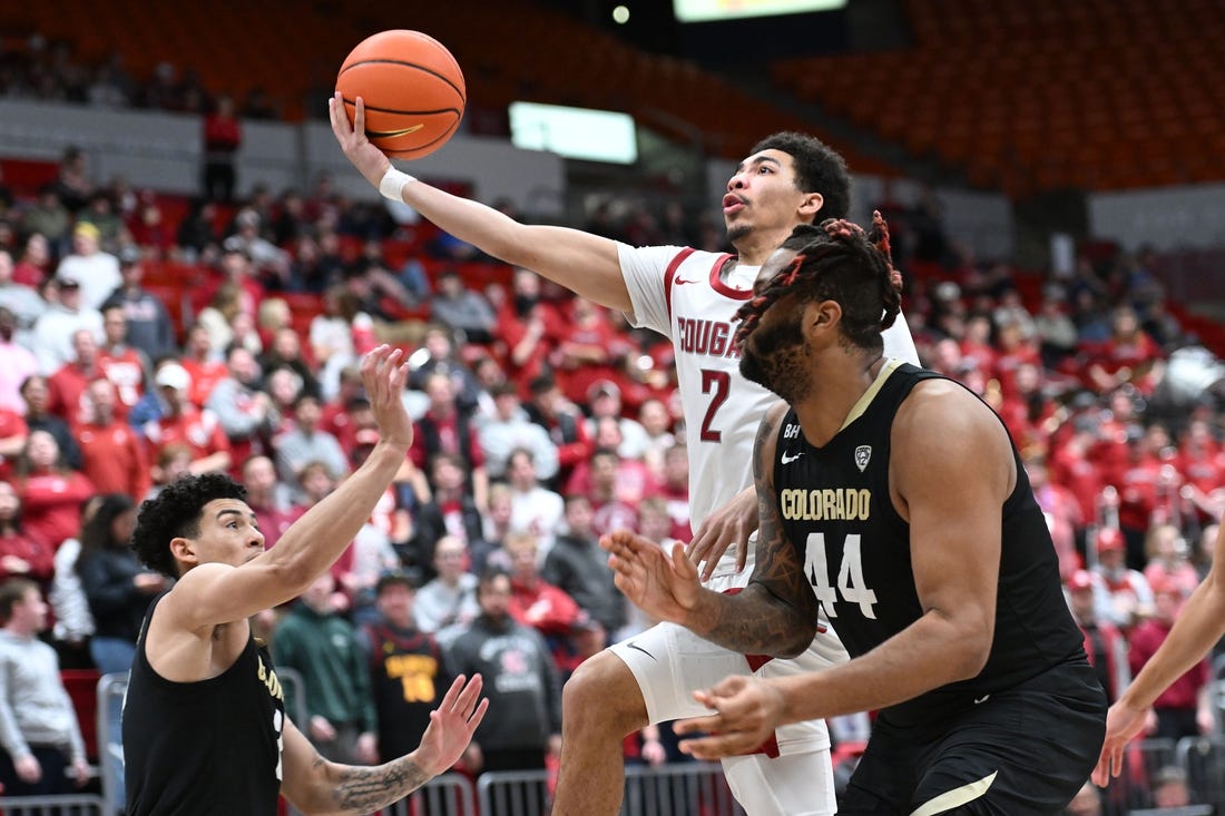 Jan 27, 2024; Pullman, Washington, USA; Washington State Cougars guard Myles Rice (2) shoots the ball against Colorado Buffaloes center Eddie Lampkin Jr. (44) in the second half at Friel Court at Beasley Coliseum. Mandatory Credit: James Snook-USA TODAY Sports