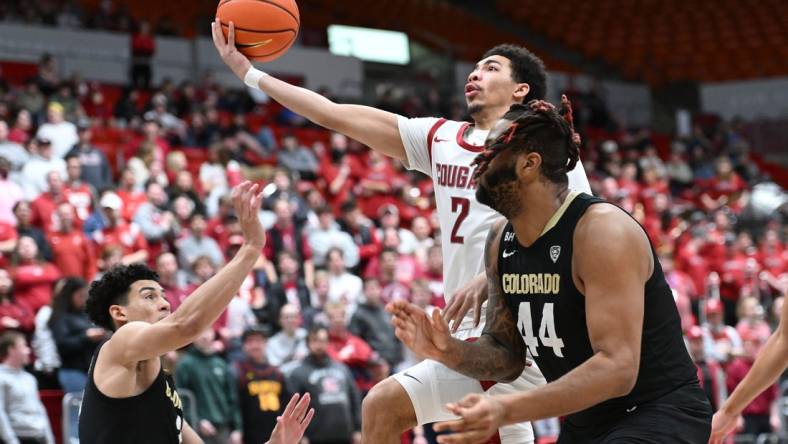 Jan 27, 2024; Pullman, Washington, USA; Washington State Cougars guard Myles Rice (2) shoots the ball against Colorado Buffaloes center Eddie Lampkin Jr. (44) in the second half at Friel Court at Beasley Coliseum. Mandatory Credit: James Snook-USA TODAY Sports