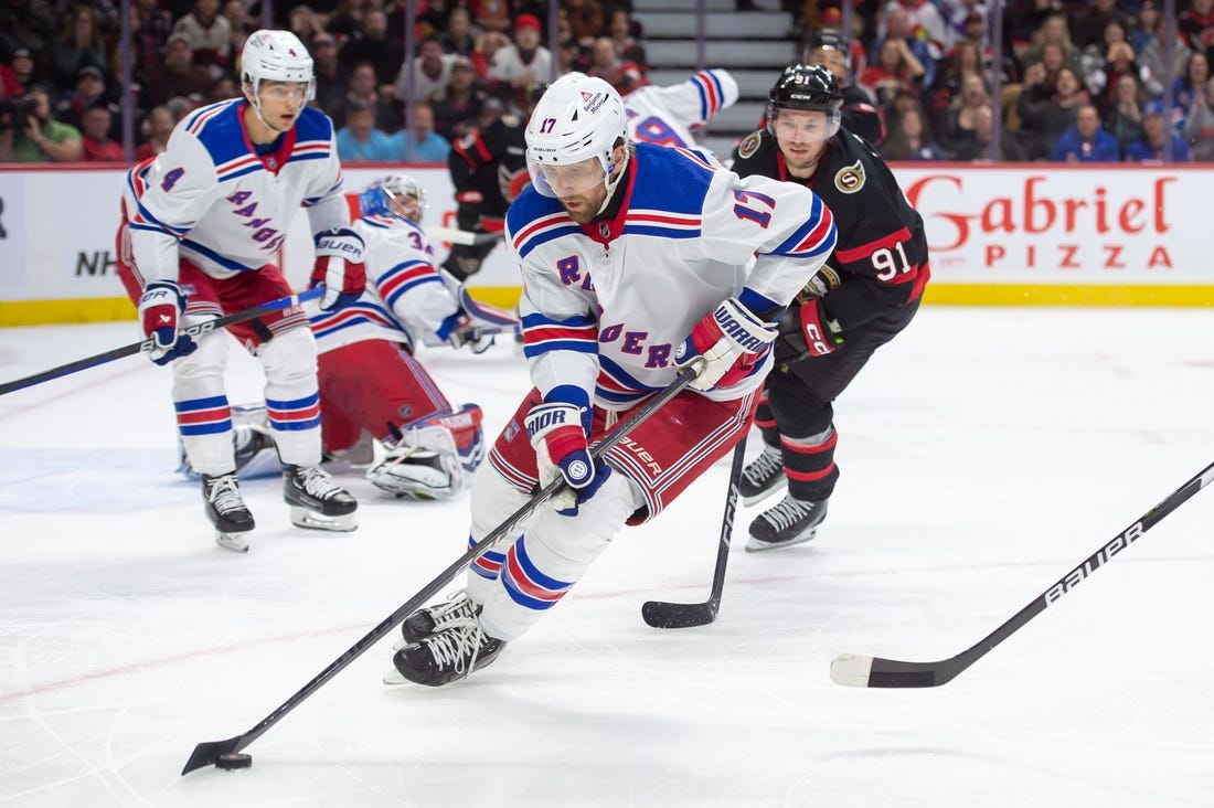 Jan 27, 2024; Ottawa, Ontario, CAN; New York Rangers right wing Blake Wheeler (17) skates with the puck in the first period against the Ottawa Senators at the Canadian Tire Centre. Mandatory Credit: Marc DesRosiers-USA TODAY Sports