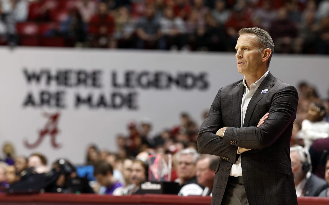 Jan 27, 2024; Tuscaloosa, Alabama, USA;  Alabama Crimson Tide head coach Nate Oats watches during the first half against the LSU Tigers at Coleman Coliseum. Mandatory Credit: Butch Dill-USA TODAY Sports