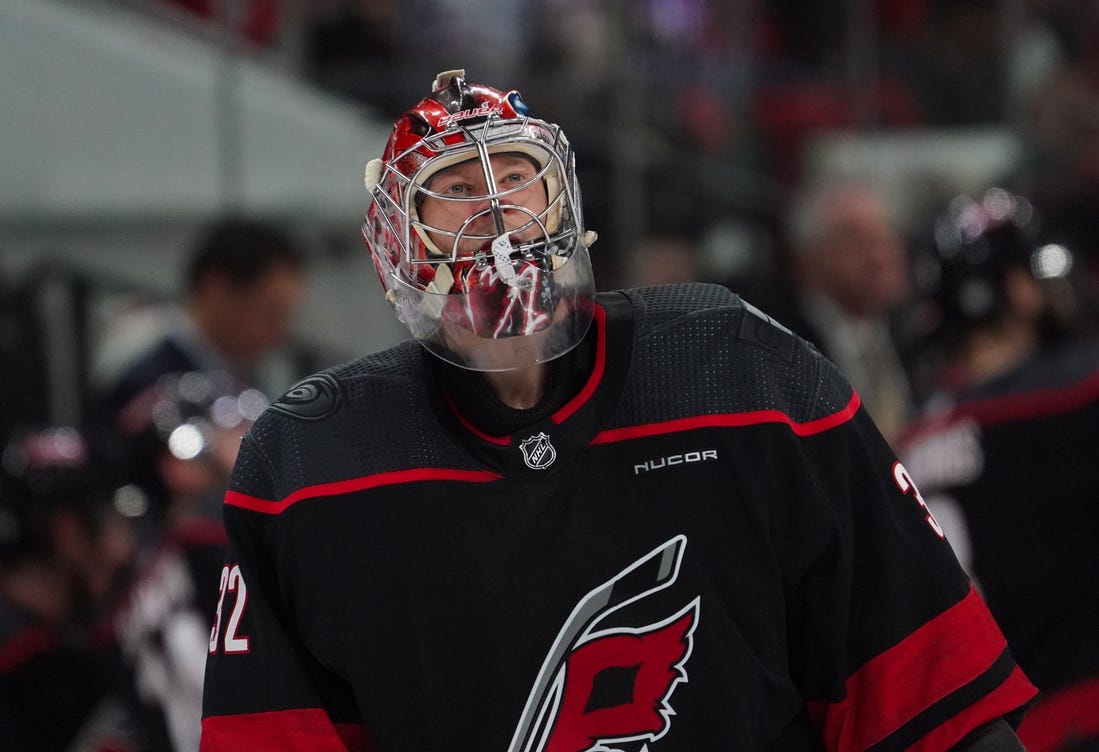 Jan 27, 2024; Raleigh, North Carolina, USA; Carolina Hurricanes goaltender Antti Raanta (32) looks on against the Arizona Coyotes during the second period at PNC Arena. Mandatory Credit: James Guillory-USA TODAY Sports