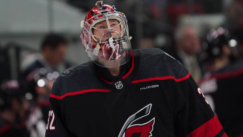 Jan 27, 2024; Raleigh, North Carolina, USA; Carolina Hurricanes goaltender Antti Raanta (32) looks on against the Arizona Coyotes during the second period at PNC Arena. Mandatory Credit: James Guillory-USA TODAY Sports