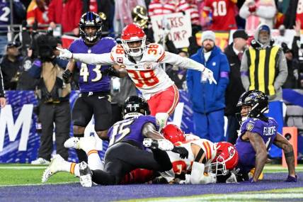 Jan 28, 2024; Baltimore, Maryland, USA; Kansas City Chiefs cornerback L'Jarius Sneed (38) celebrates as cornerback Trent McDuffie (22) recovers a fumble against Baltimore Ravens wide receiver Zay Flowers (4) and wide receiver Nelson Agholor (15) for a turnover during the second half in the AFC Championship football game at M&T Bank Stadium. Mandatory Credit: Tommy Gilligan-USA TODAY Sports