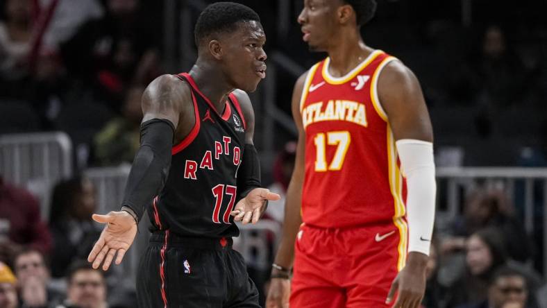 Jan 28, 2024; Atlanta, Georgia, USA; Toronto Raptors guard Dennis Schroder (17) reacts after being called for a charge after running into Atlanta Hawks guard Patty Mills (8) (not shown) during the first half at State Farm Arena. Mandatory Credit: Dale Zanine-USA TODAY Sports