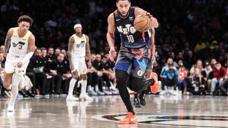 Jan 29, 2024; Brooklyn, New York, USA;  Brooklyn Nets guard Ben Simmons (10) brings the ball up court in the third quarter against the Utah Jazz at Barclays Center. Mandatory Credit: Wendell Cruz-USA TODAY Sports