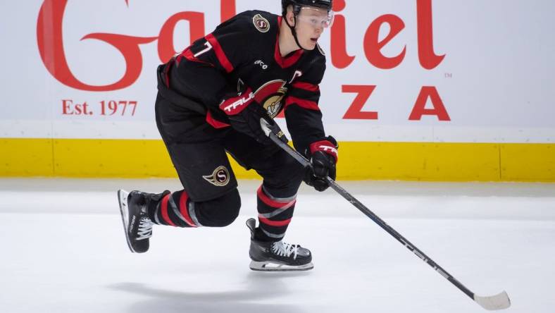 Jan 29, 2024; Ottawa, Ontario, CAN; Ottawa Senators left wing Brady Tkachuk (7) skates with the puck in overtime against the Nashville Predators at the Canadian Tire Centre. Mandatory Credit: Marc DesRosiers-USA TODAY Sports